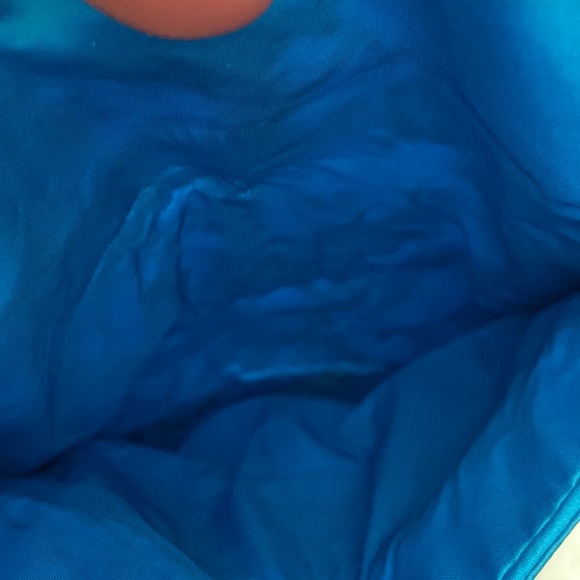 Blue embroidered jewelry roll. - Picture 3 of 4